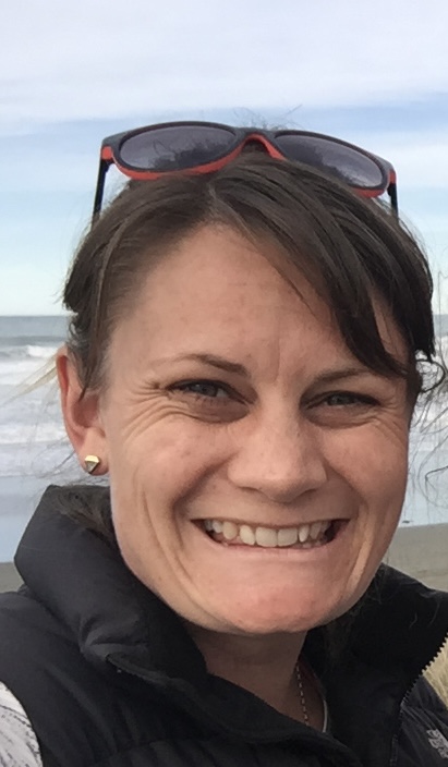 Penny Willocks smiling at the beach